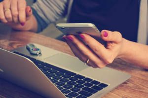 Woman holding cell phone